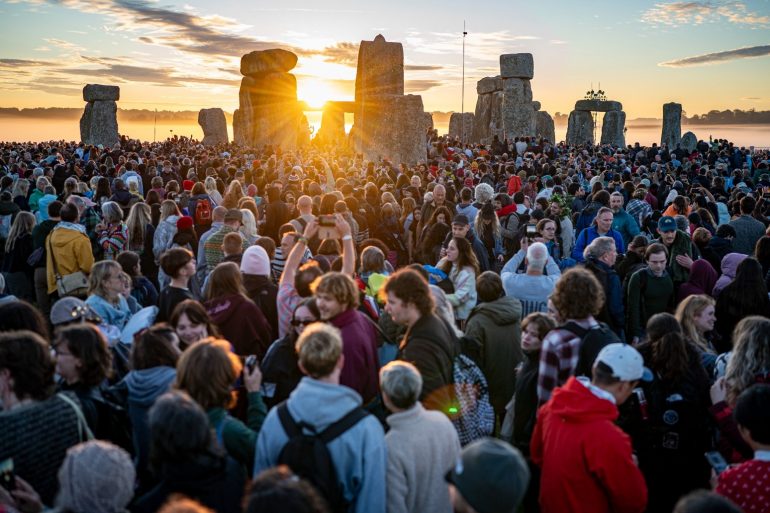 Thousands Gather For Summer Solstice As UK Braces For Sweltering Heatwave